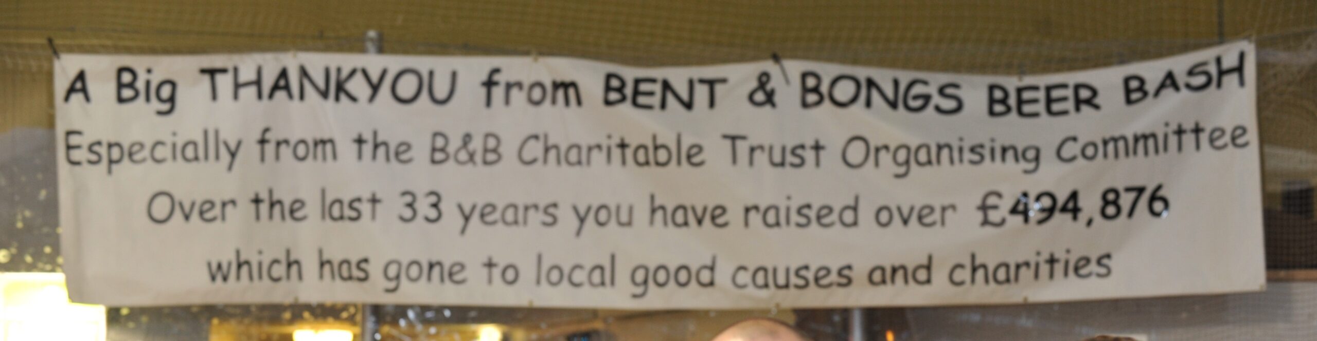 The banner for the 2024 Bent and Bongs Beer Bash shows a total of £494,876 total raised for charity.